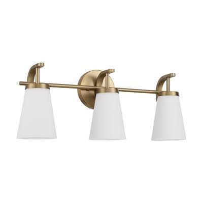 23'' W x 9'' H  3-Light Vanity in Aged Brass with Tapered Soft White Glass
