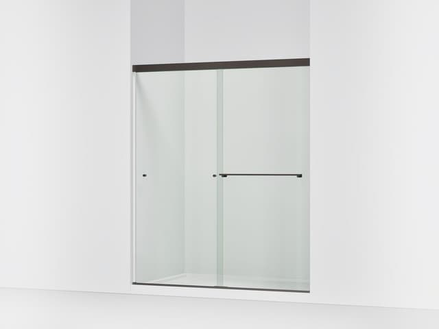 Kohler Revel Sliding shower door, 70'' H x 56-5/8 - 59-5/8'' W, with 1/4'' thick Crystal Clear glass - Anodized Dark Bronze
