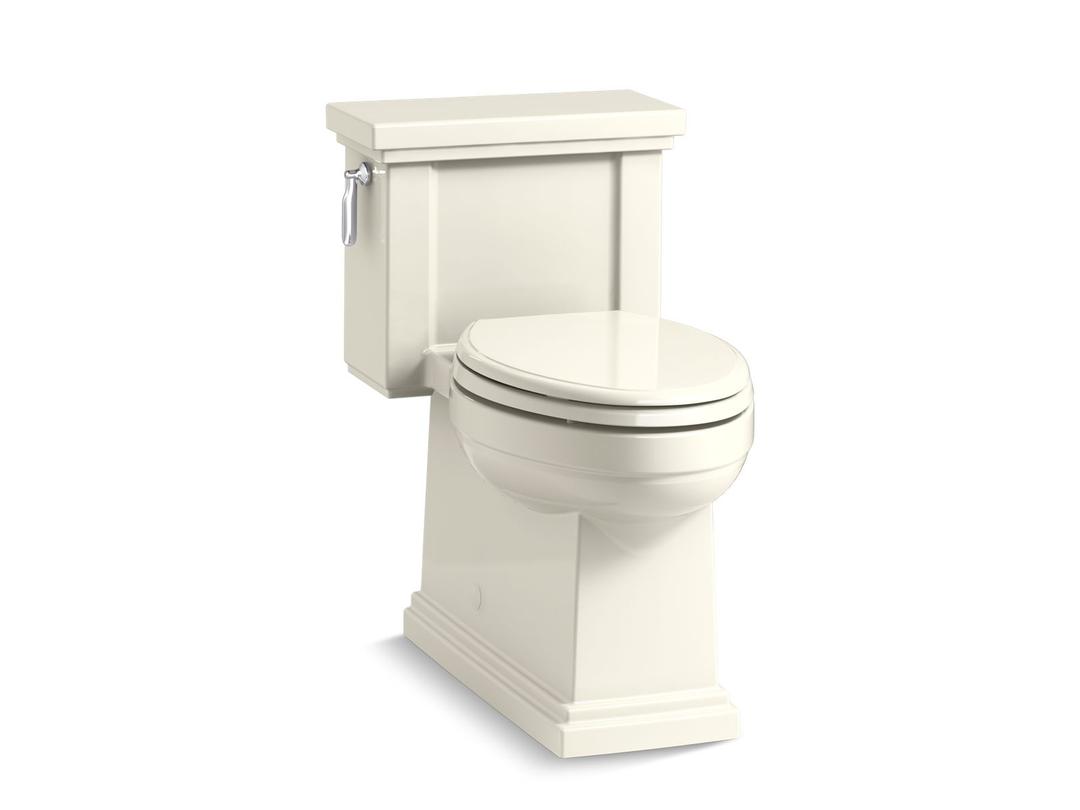 Kohler Tresham Comfort Height One-piece compact elongated 1.28 gpf chair height toilet with Quiet-CloseE seat - Biscuit by Kohler