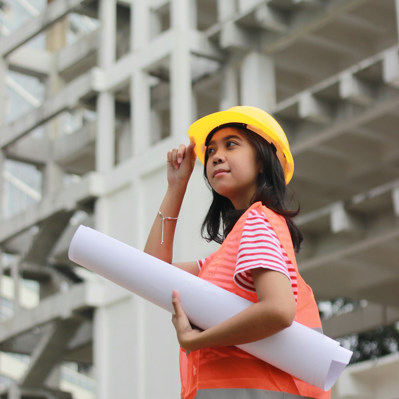 Design professional reviewing floor plans