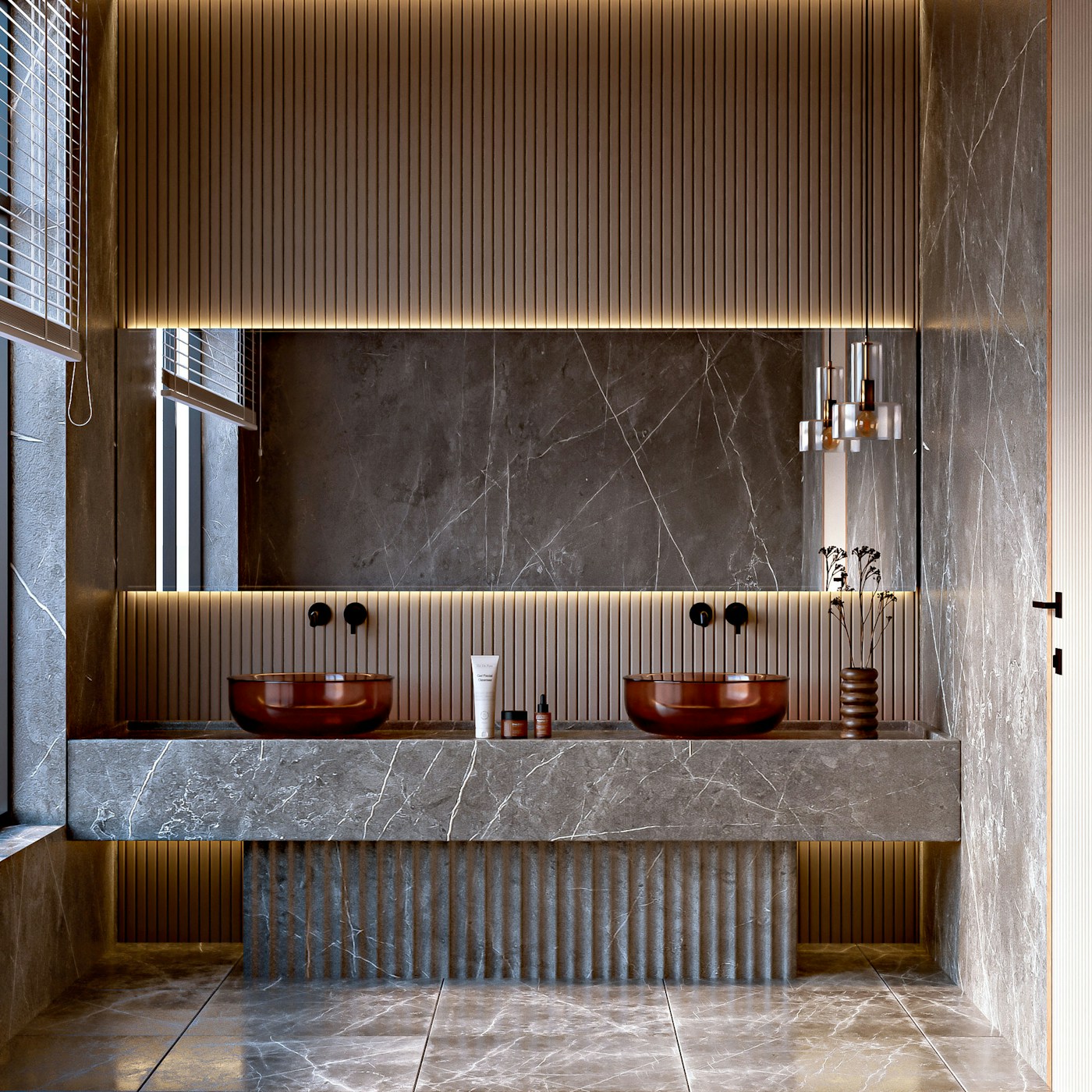 Showroom bathroom vignette with marble vanity and vessel sinks